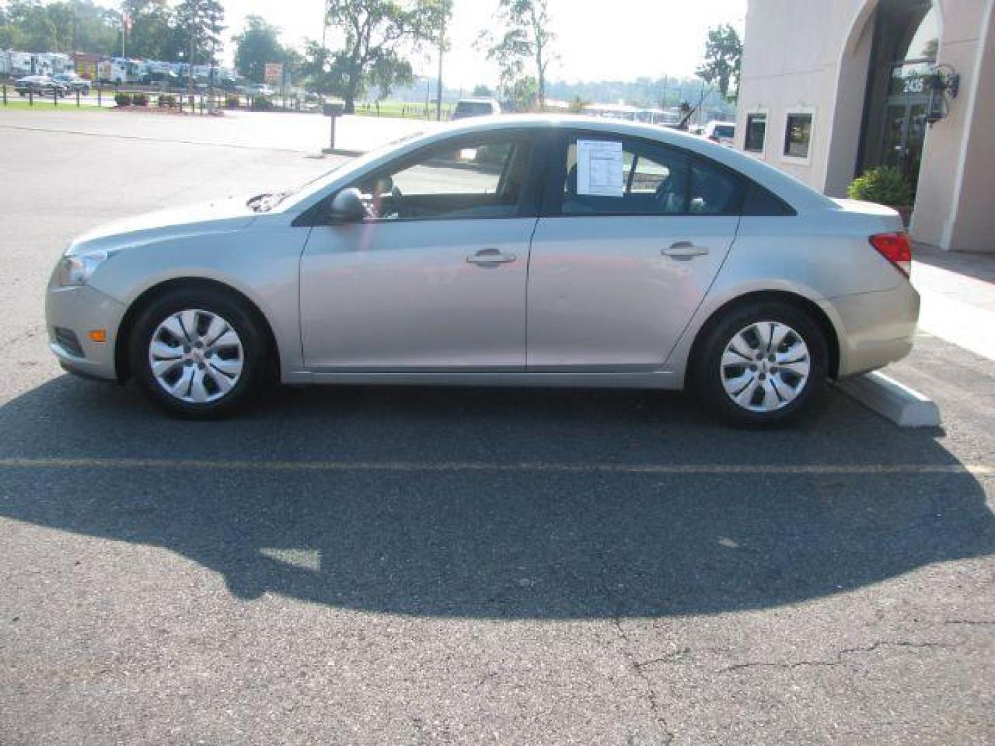 2013 Gold Chevrolet Cruze LS Auto (1G1PA5SH6D7) with an ECOTEC 1.8L I-4 DOHC engine, Automatic transmission, located at 2443 Albert Pike, Hot Springs, AR, 71913, (501) 623-6255, 34.492222, -93.109993 - Photo#1