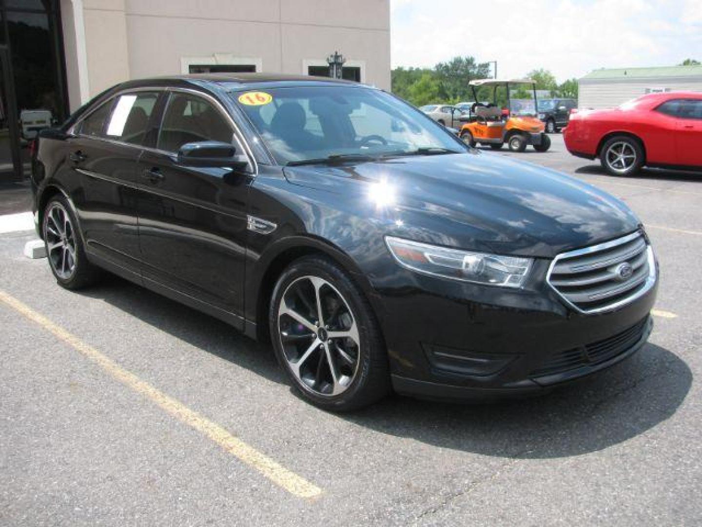 2016 Black Ford Taurus SEL (1FAHP2E87GG) with an EcoBoost 2L I-4 gasoline direct injection engine, Automatic transmission, located at 2443 Albert Pike, Hot Springs, AR, 71913, (501) 623-6255, 34.492222, -93.109993 - Photo#5