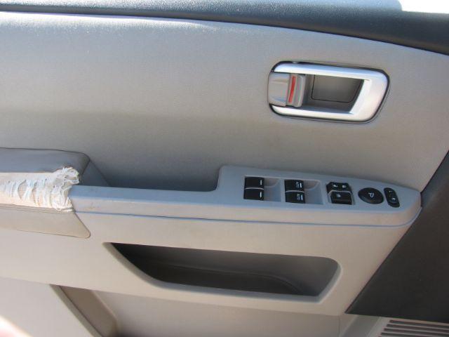 2011 Silver Honda Pilot EX (5FNYF3H49BB) with an 3.5L V-6 i-VTEC VCM variable valve control engine, located at 2443 Albert Pike, Hot Springs, AR, 71913, (501) 623-6255, 34.492222, -93.109993 - Photo#9