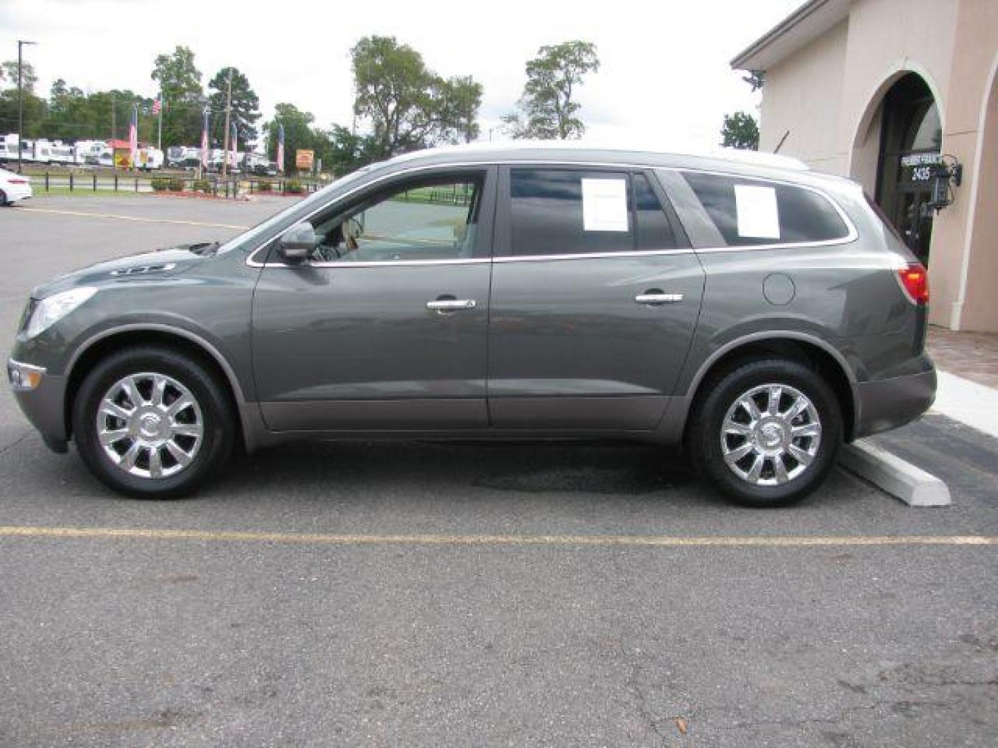 2011 Green Buick Enclave 1XL (5GAKRBED9BJ) with an 3.6L V-6 gasoline direct injection engine, Automatic transmission, located at 2443 Albert Pike, Hot Springs, AR, 71913, (501) 623-6255, 34.492222, -93.109993 - Photo#1