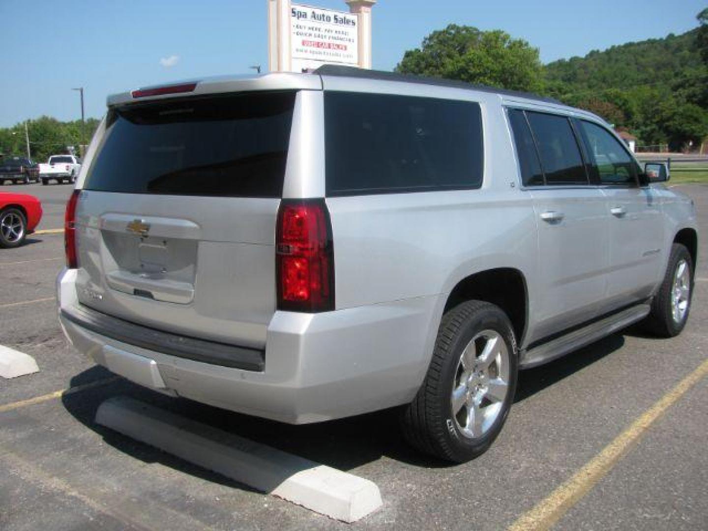 2015 Silver Chevrolet Suburban 1500 LT (1GNSCJKC5FR) with an EcoTec3 5.3L V-8 gasoline direct injection engine, Automatic transmission, located at 2443 Albert Pike, Hot Springs, AR, 71913, (501) 623-6255, 34.492222, -93.109993 - Photo#2
