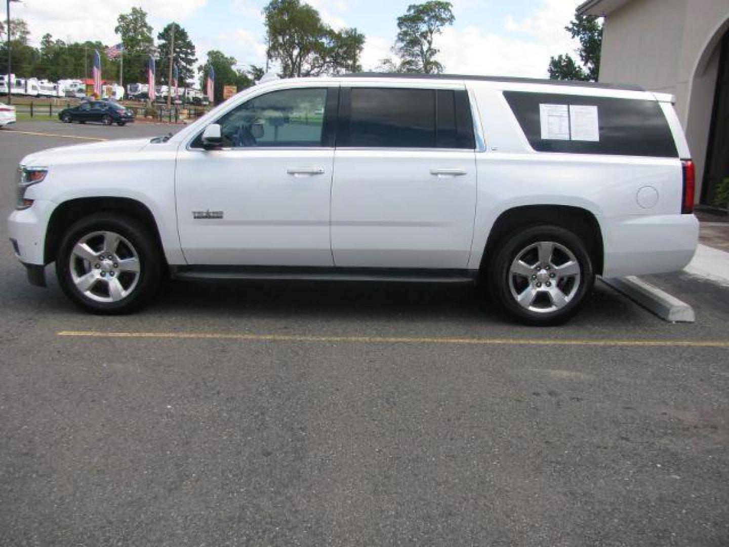 2016 White Chevrolet Suburban LT (1GNSKHKC1GR) with an EcoTec3 5.3L V-8 gasoline direct injection engine, Automatic transmission, located at 2443 Albert Pike, Hot Springs, AR, 71913, (501) 623-6255, 34.492222, -93.109993 - Photo#1