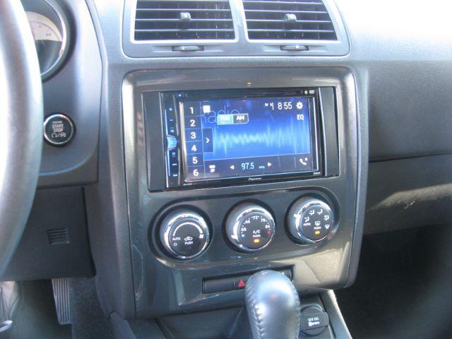 2014 White Dodge Challenger SXT (2C3CDYAG1EH) with an 3.6L V-6 DOHC engine, Automatic transmission, located at 2443 Albert Pike, Hot Springs, AR, 71913, (501) 623-6255, 34.492222, -93.109993 - Photo#8