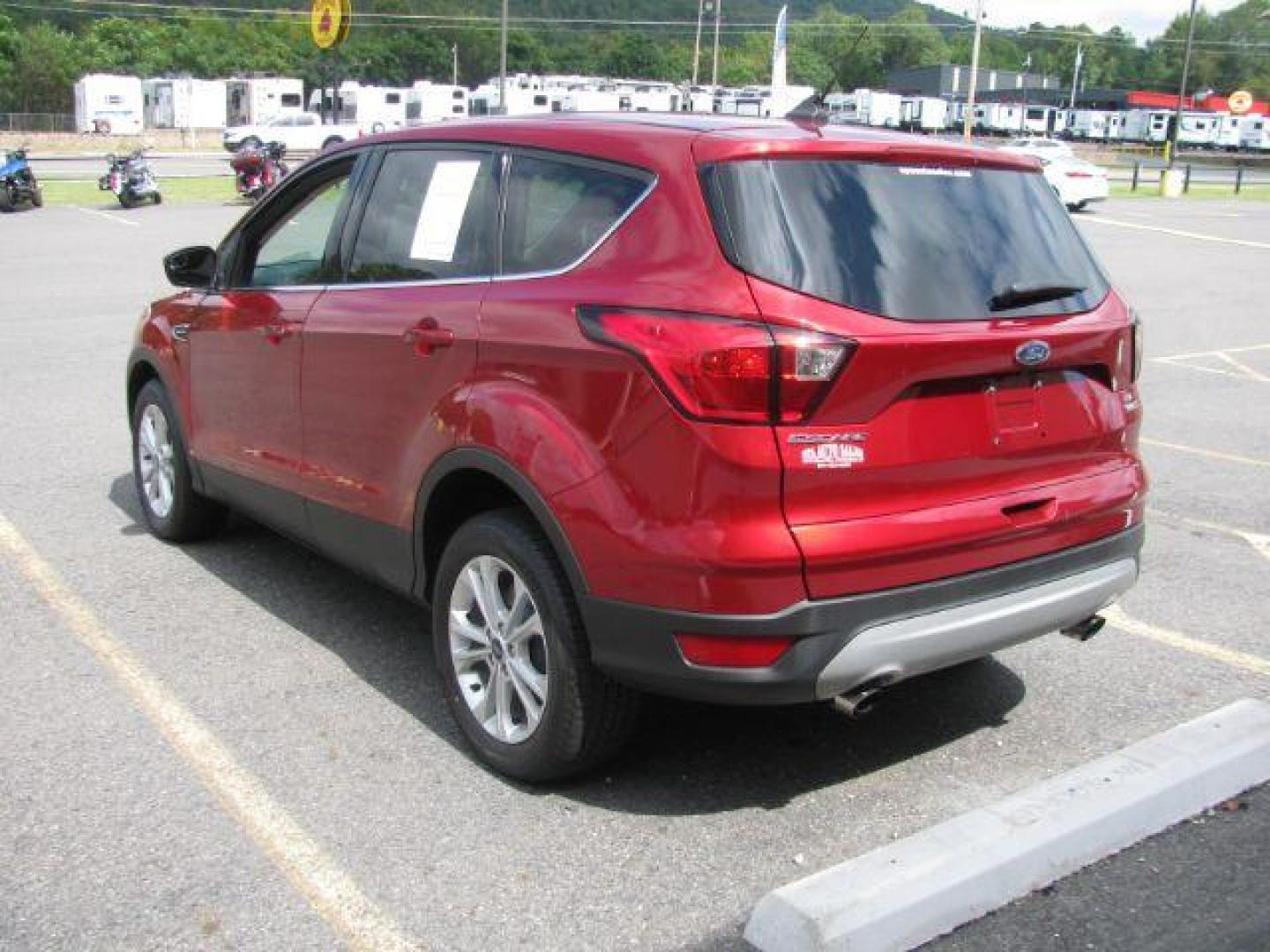 2019 Red Ford Escape SE (1FMCU9GD9KU) with an EcoBoost 1.5L I-4 gasoline direct injection engine, Automatic transmission, located at 2443 Albert Pike, Hot Springs, AR, 71913, (501) 623-6255, 34.492222, -93.109993 - Photo#2