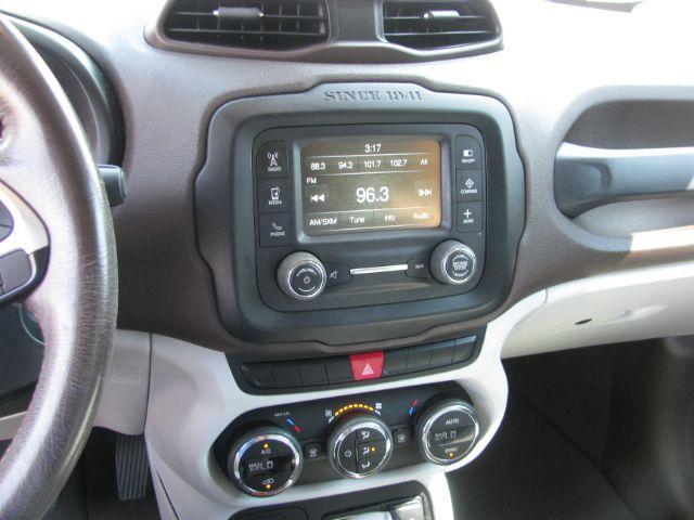 2015 Orange Jeep Renegade Latitude (ZACCJABT8FP) with an MultiAir2 Tigershark 2.4L I-4 variable valve contr engine, Automatic transmission, located at 2443 Albert Pike, Hot Springs, AR, 71913, (501) 623-6255, 34.492222, -93.109993 - Photo#9