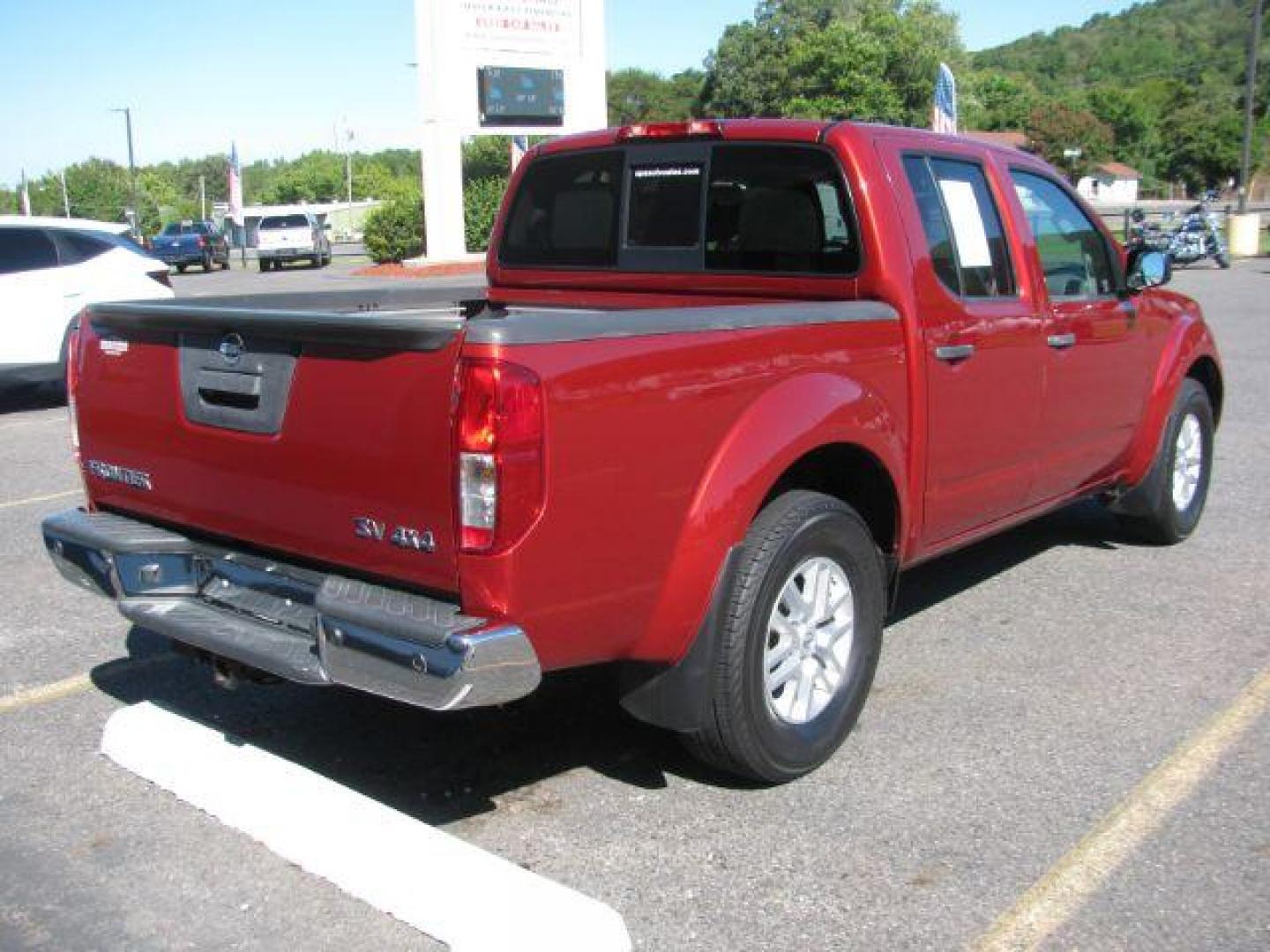 2016 Maroon Nissan Frontier SV (1N6AD0EV3GN) with an VQ 4L V-6 DOHC engine, Automatic transmission, located at 2443 Albert Pike, Hot Springs, AR, 71913, (501) 623-6255, 34.492222, -93.109993 - Photo#2