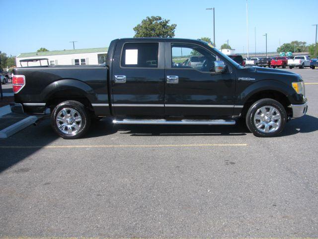 2010 Black Ford F-150 XLT SuperCrew 5.5-ft. Bed 2WD (1FTEW1C82AF) with an 4.6L V8 SOHC 24V engine, 4-Speed Automatic transmission, located at 2443 Albert Pike, Hot Springs, AR, 71913, (501) 623-6255, 34.492222, -93.109993 - Photo#1