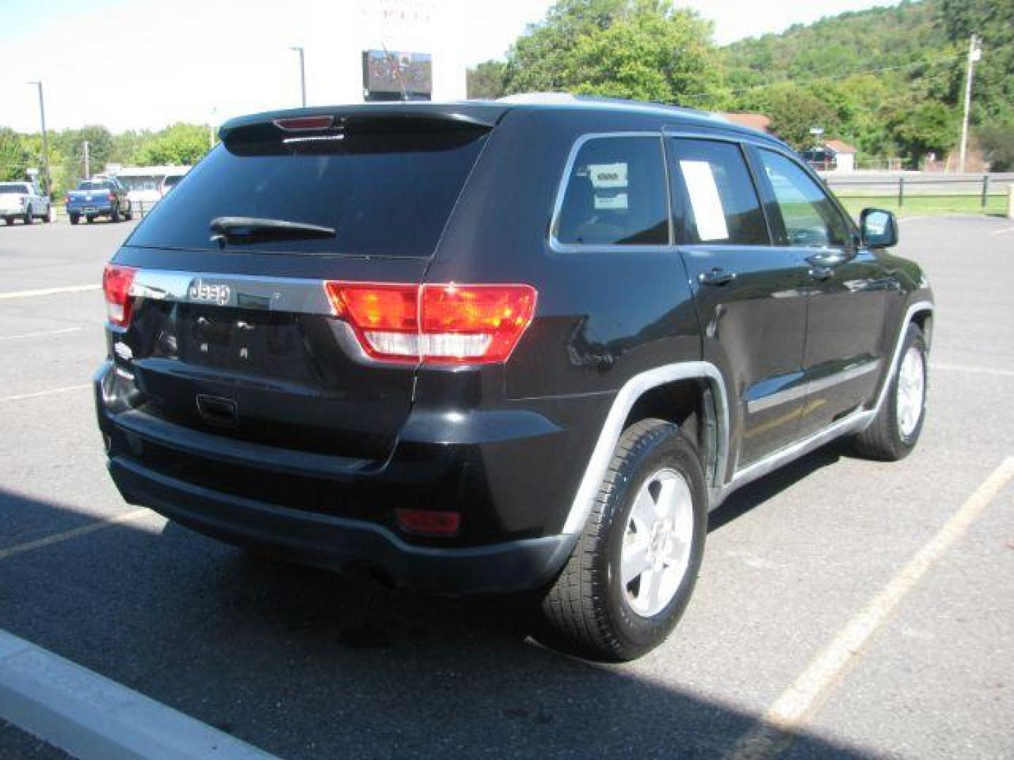 2012 Black Jeep Grand Cherokee Laredo (1C4RJEAG3CC) with an 3.6L V-6 DOHC engine, Automatic transmission, located at 2443 Albert Pike, Hot Springs, AR, 71913, (501) 623-6255, 34.492222, -93.109993 - Photo#2