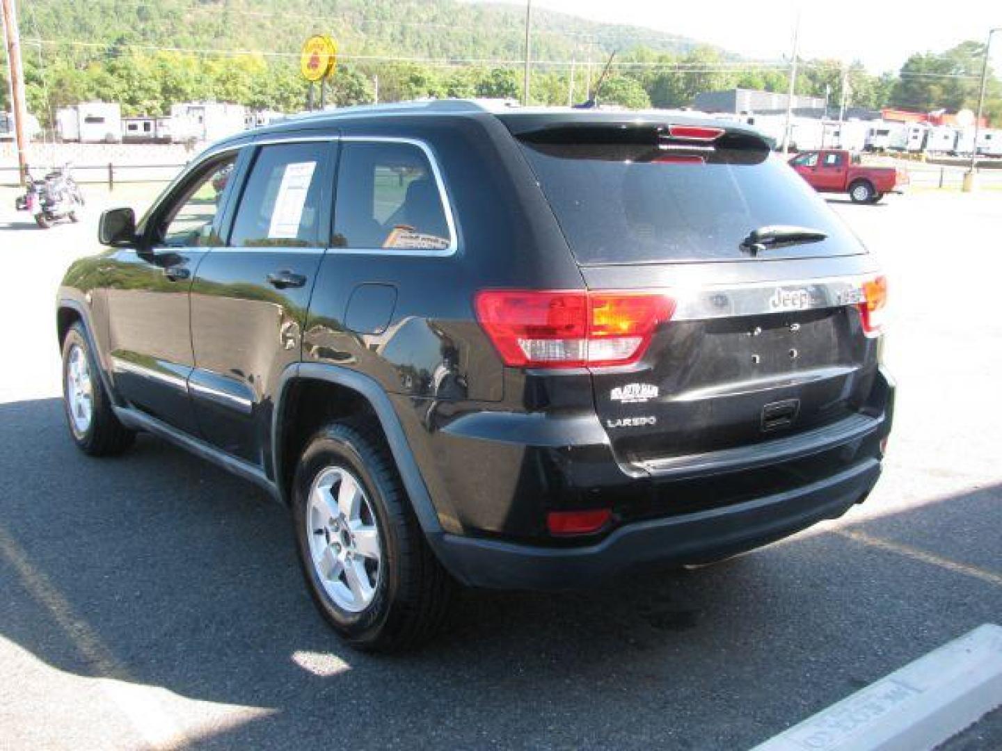2012 Black Jeep Grand Cherokee Laredo (1C4RJEAG3CC) with an 3.6L V-6 DOHC engine, Automatic transmission, located at 2443 Albert Pike, Hot Springs, AR, 71913, (501) 623-6255, 34.492222, -93.109993 - Photo#3