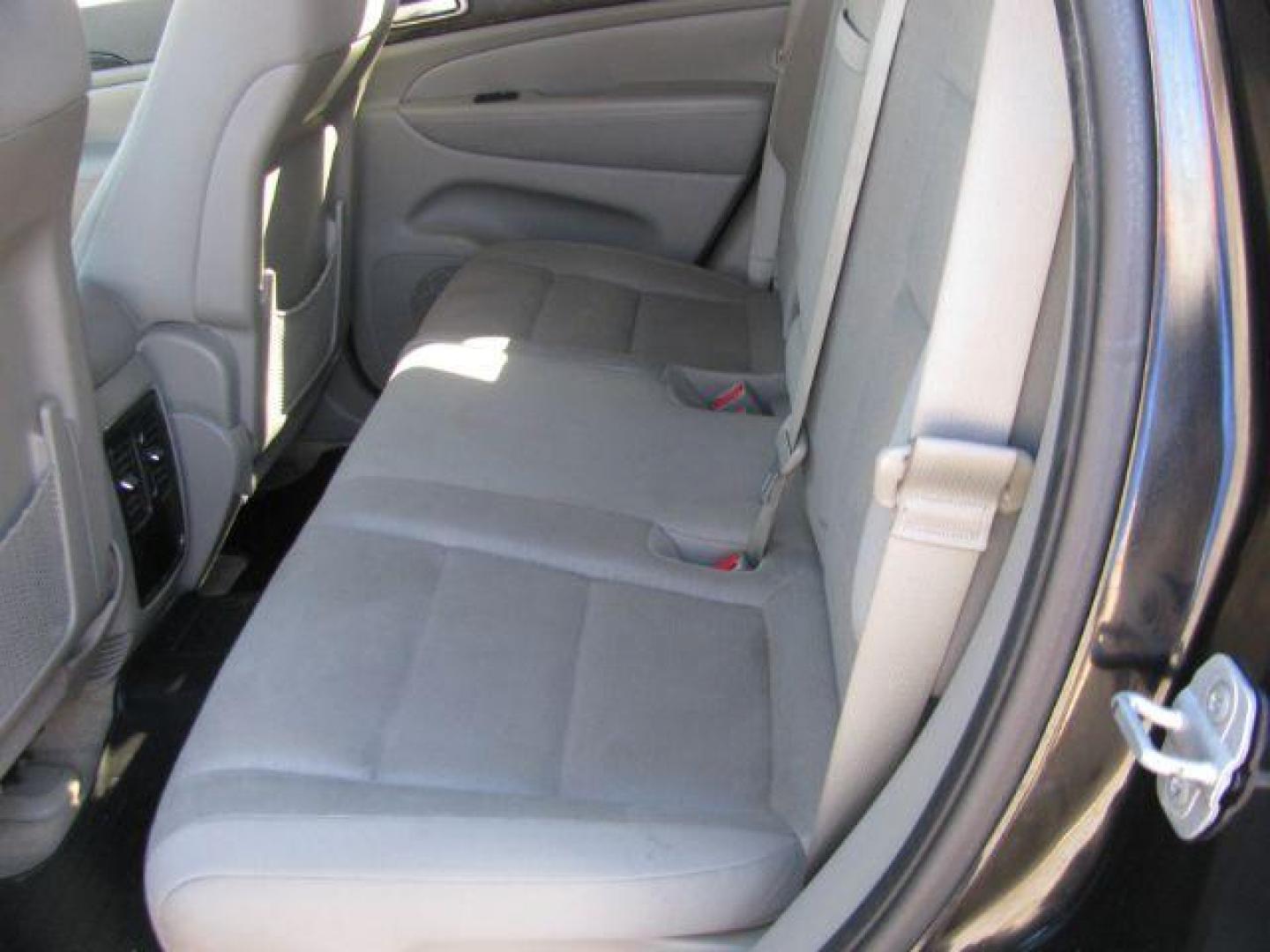 2012 Black Jeep Grand Cherokee Laredo (1C4RJEAG3CC) with an 3.6L V-6 DOHC engine, Automatic transmission, located at 2443 Albert Pike, Hot Springs, AR, 71913, (501) 623-6255, 34.492222, -93.109993 - Photo#7
