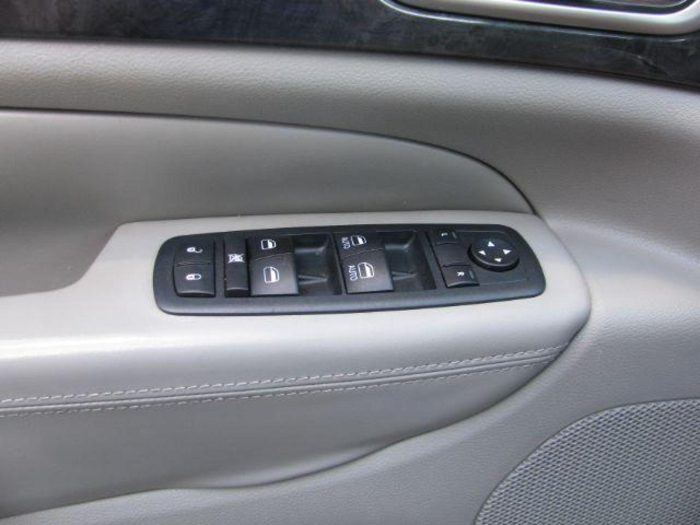 2012 Black Jeep Grand Cherokee Laredo (1C4RJEAG3CC) with an 3.6L V-6 DOHC engine, Automatic transmission, located at 2443 Albert Pike, Hot Springs, AR, 71913, (501) 623-6255, 34.492222, -93.109993 - Photo#10