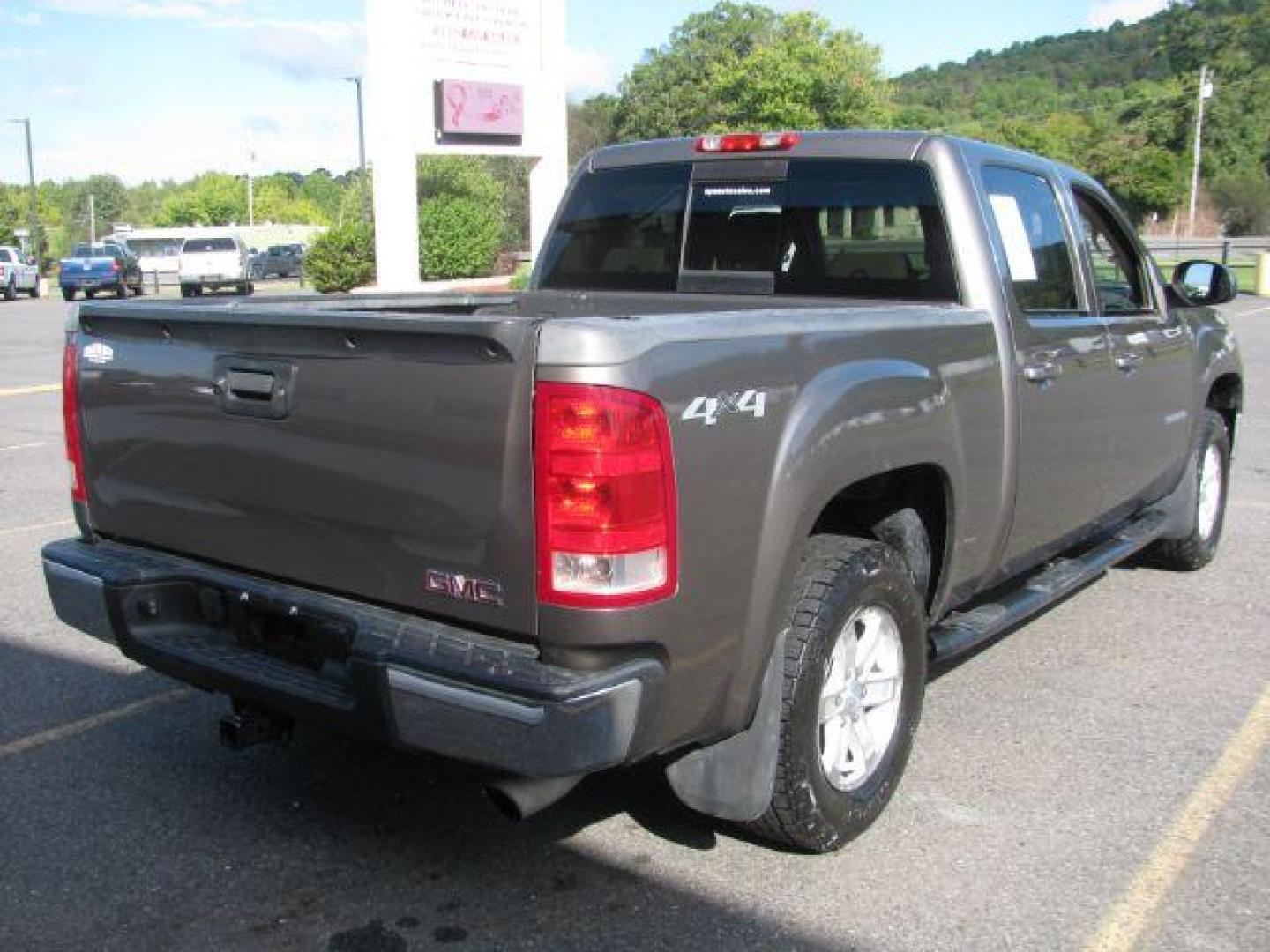 2013 Brown GMC Sierra 1500 SLT (3GTU2WE20DG) with an Vortec 5.3L V-8 variable valve control engine, Automatic transmission, located at 2443 Albert Pike, Hot Springs, AR, 71913, (501) 623-6255, 34.492222, -93.109993 - Photo#2