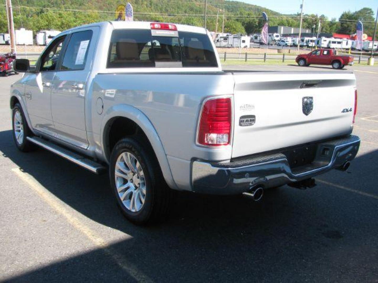 2015 Silver Ram 1500 Laramie Longhorn (1C6RR7PT8FS) with an HEMI 5.7L V-8 variable valve control engine, Automatic transmission, located at 2443 Albert Pike, Hot Springs, AR, 71913, (501) 623-6255, 34.492222, -93.109993 - Photo#2
