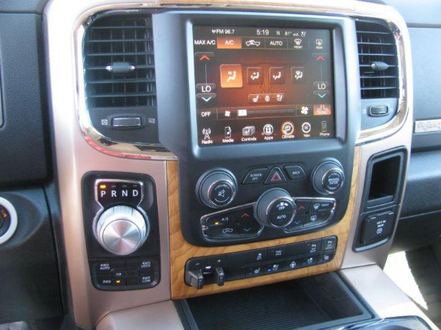 2015 Silver Ram 1500 Laramie Longhorn (1C6RR7PT8FS) with an HEMI 5.7L V-8 variable valve control engine, Automatic transmission, located at 2443 Albert Pike, Hot Springs, AR, 71913, (501) 623-6255, 34.492222, -93.109993 - Photo#10