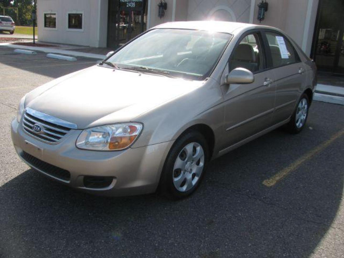 2007 Gold Kia Spectra EX (KNAFE121675) with an 2L I-4 DOHC engine, located at 2443 Albert Pike, Hot Springs, AR, 71913, (501) 623-6255, 34.492222, -93.109993 - Photo#0