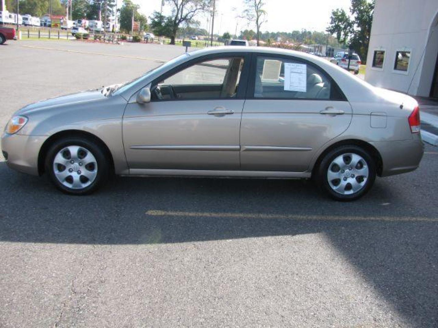 2007 Gold Kia Spectra EX (KNAFE121675) with an 2L I-4 DOHC engine, located at 2443 Albert Pike, Hot Springs, AR, 71913, (501) 623-6255, 34.492222, -93.109993 - Photo#1