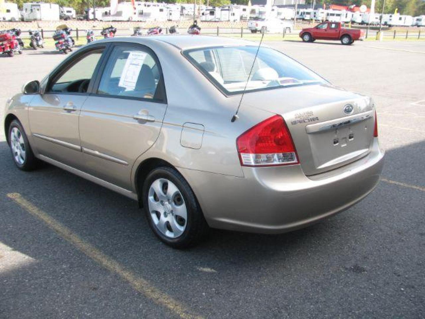 2007 Gold Kia Spectra EX (KNAFE121675) with an 2L I-4 DOHC engine, located at 2443 Albert Pike, Hot Springs, AR, 71913, (501) 623-6255, 34.492222, -93.109993 - Photo#2