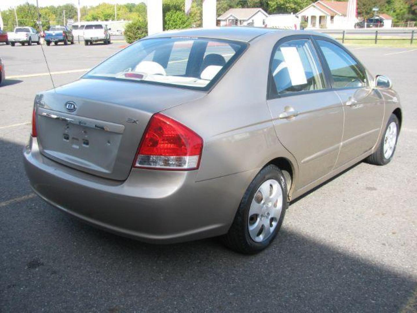 2007 Gold Kia Spectra EX (KNAFE121675) with an 2L I-4 DOHC engine, located at 2443 Albert Pike, Hot Springs, AR, 71913, (501) 623-6255, 34.492222, -93.109993 - Photo#3