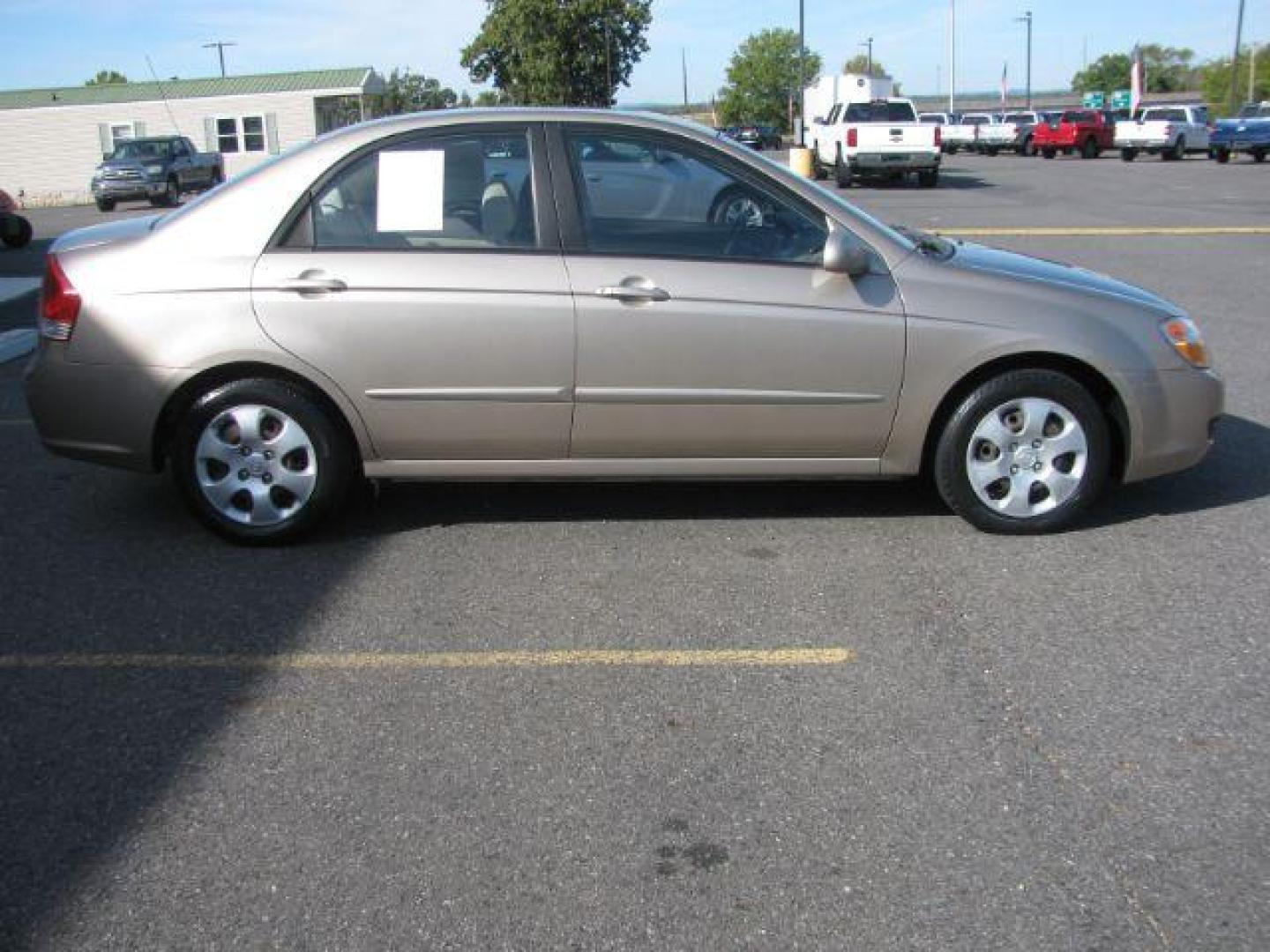 2007 Gold Kia Spectra EX (KNAFE121675) with an 2L I-4 DOHC engine, located at 2443 Albert Pike, Hot Springs, AR, 71913, (501) 623-6255, 34.492222, -93.109993 - Photo#4
