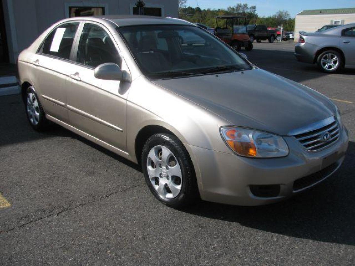 2007 Gold Kia Spectra EX (KNAFE121675) with an 2L I-4 DOHC engine, located at 2443 Albert Pike, Hot Springs, AR, 71913, (501) 623-6255, 34.492222, -93.109993 - Photo#5