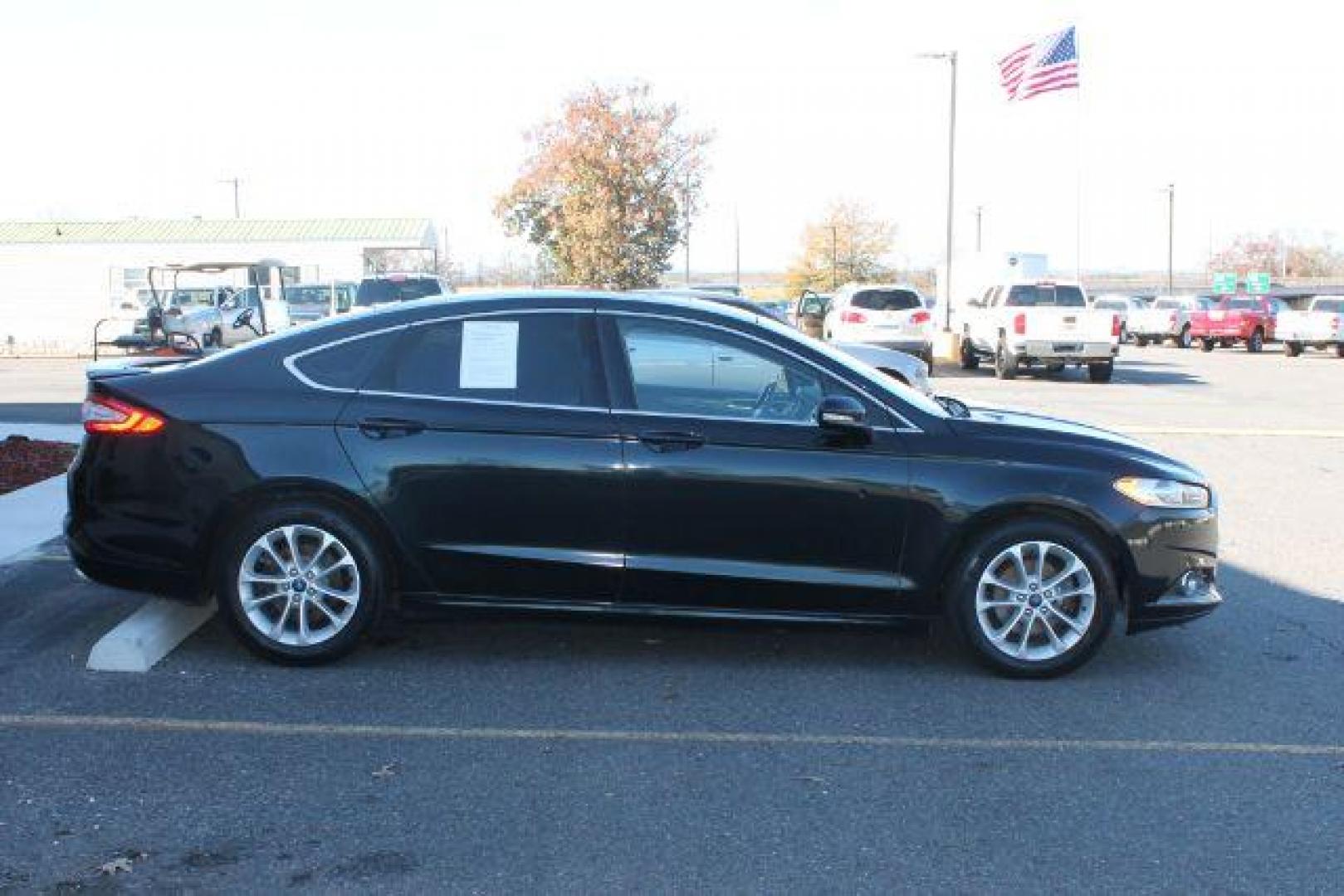 2014 Black Ford Fusion SE (3FA6P0HD9ER) with an EcoBoost 1.5L I-4 gasoline direct injection engine, Automatic transmission, located at 2443 Albert Pike, Hot Springs, AR, 71913, (501) 623-6255, 34.492222, -93.109993 - Photo#1