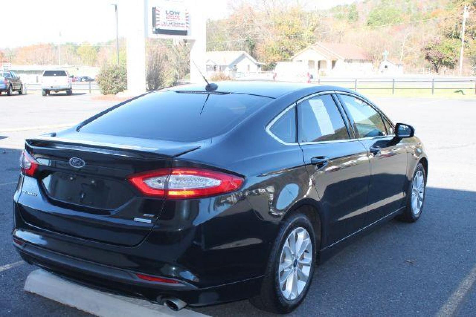 2014 Black Ford Fusion SE (3FA6P0HD9ER) with an EcoBoost 1.5L I-4 gasoline direct injection engine, Automatic transmission, located at 2443 Albert Pike, Hot Springs, AR, 71913, (501) 623-6255, 34.492222, -93.109993 - Photo#2