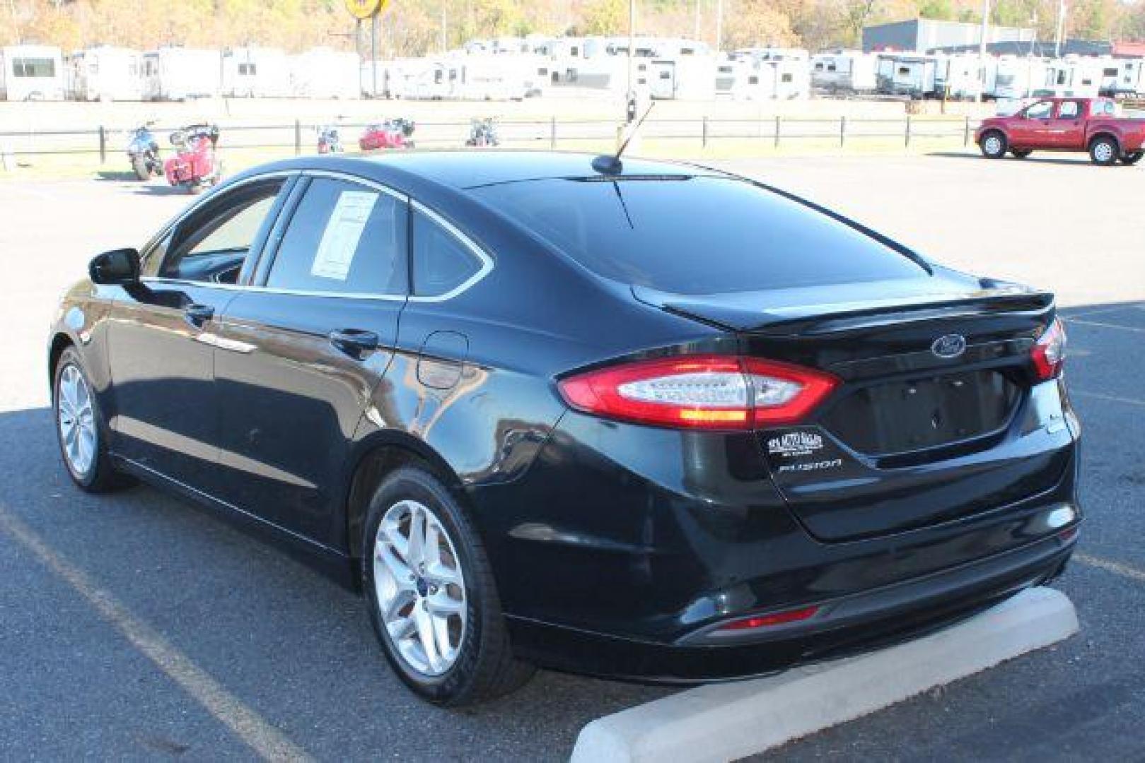 2014 Black Ford Fusion SE (3FA6P0HD9ER) with an EcoBoost 1.5L I-4 gasoline direct injection engine, Automatic transmission, located at 2443 Albert Pike, Hot Springs, AR, 71913, (501) 623-6255, 34.492222, -93.109993 - Photo#3