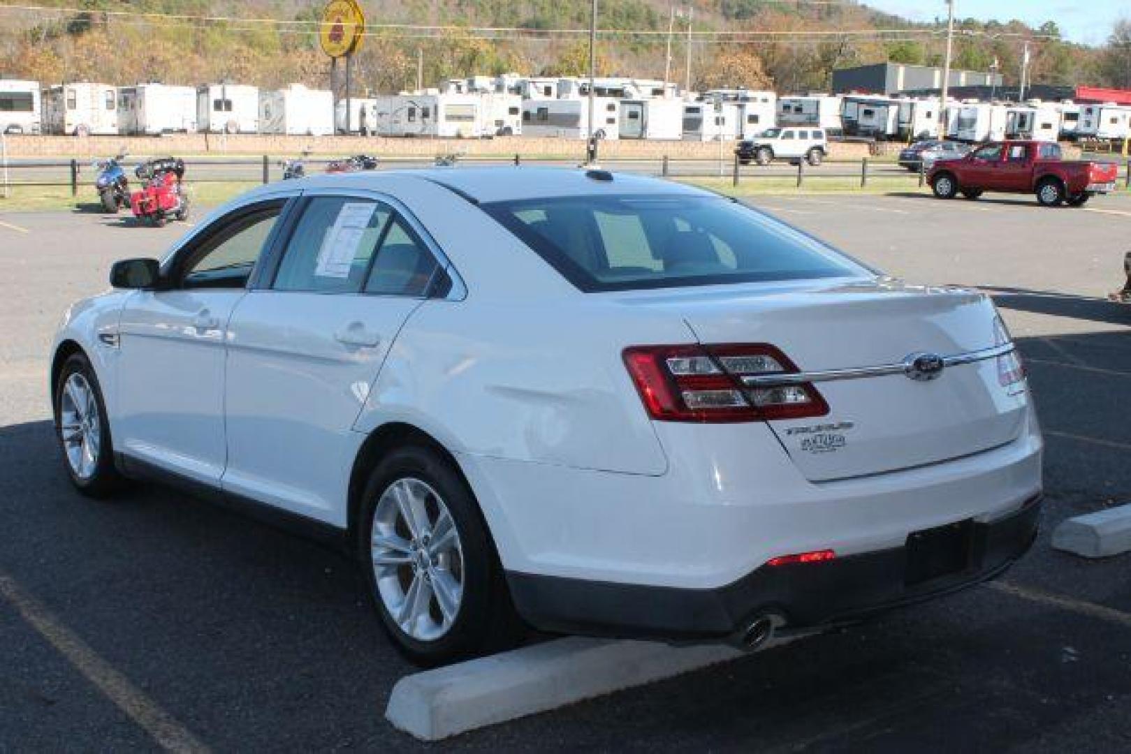 2015 White Ford Taurus SE (1FAHP2D80FG) with an EcoBoost 2L I-4 gasoline direct injection engine, Automatic transmission, located at 2443 Albert Pike, Hot Springs, AR, 71913, (501) 623-6255, 34.492222, -93.109993 - Photo#2