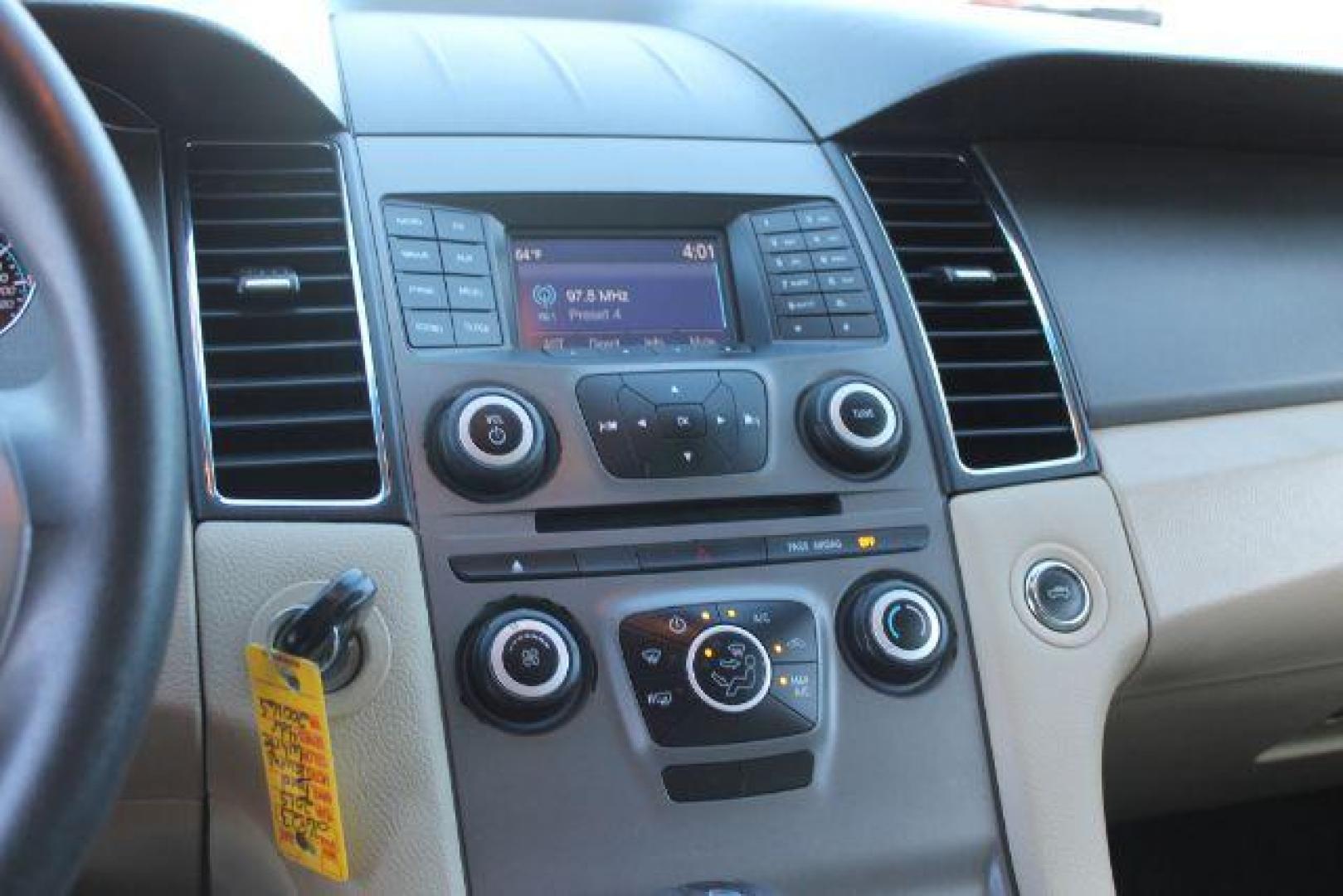 2015 White Ford Taurus SE (1FAHP2D80FG) with an EcoBoost 2L I-4 gasoline direct injection engine, Automatic transmission, located at 2443 Albert Pike, Hot Springs, AR, 71913, (501) 623-6255, 34.492222, -93.109993 - Photo#9