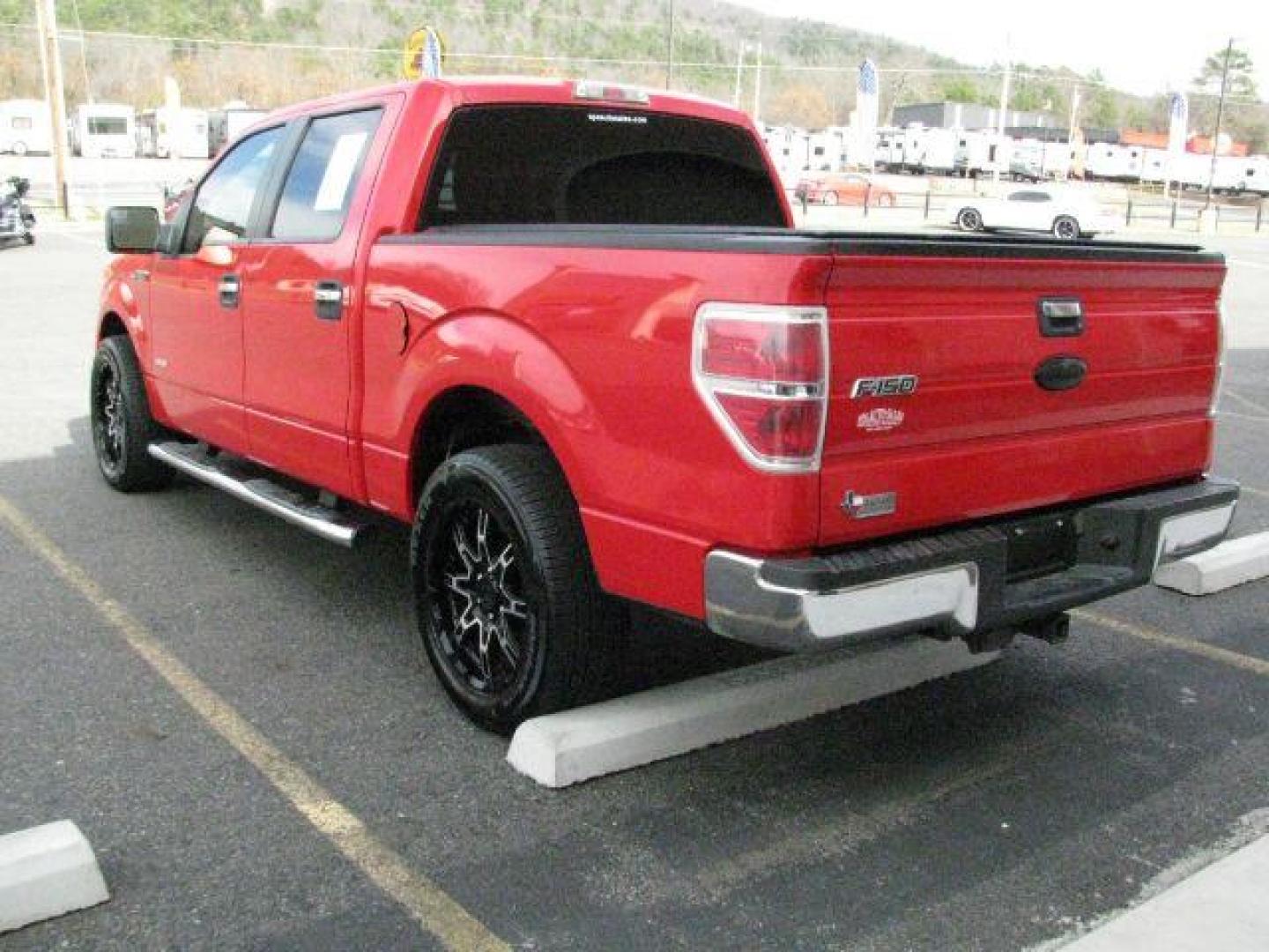 2011 Red Ford F-150 XLT (1FTFW1CT3BF) with an EcoBoost 3.5L V-6 gasoline direct injection engine, Automatic transmission, located at 2443 Albert Pike, Hot Springs, AR, 71913, (501) 623-6255, 34.492222, -93.109993 - Photo#2