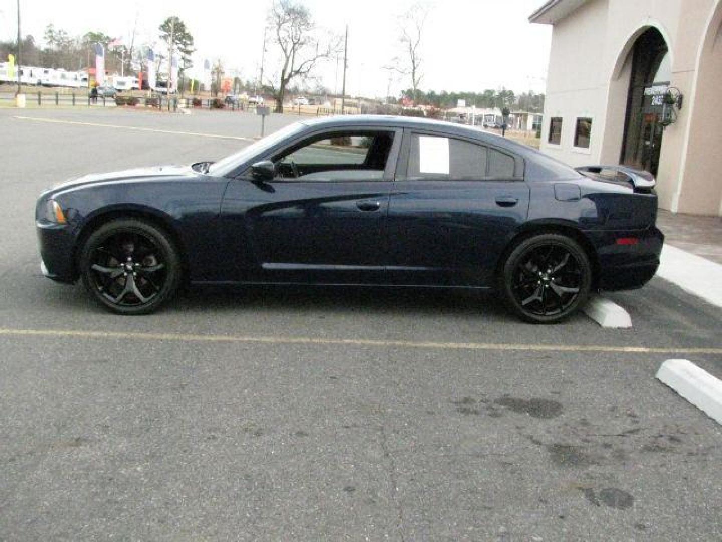 2014 Blue Dodge Charger SXT Plus (2C3CDXHG5EH) with an 3.6L V-6 DOHC engine, Automatic transmission, located at 2443 Albert Pike, Hot Springs, AR, 71913, (501) 623-6255, 34.492222, -93.109993 - Photo#1
