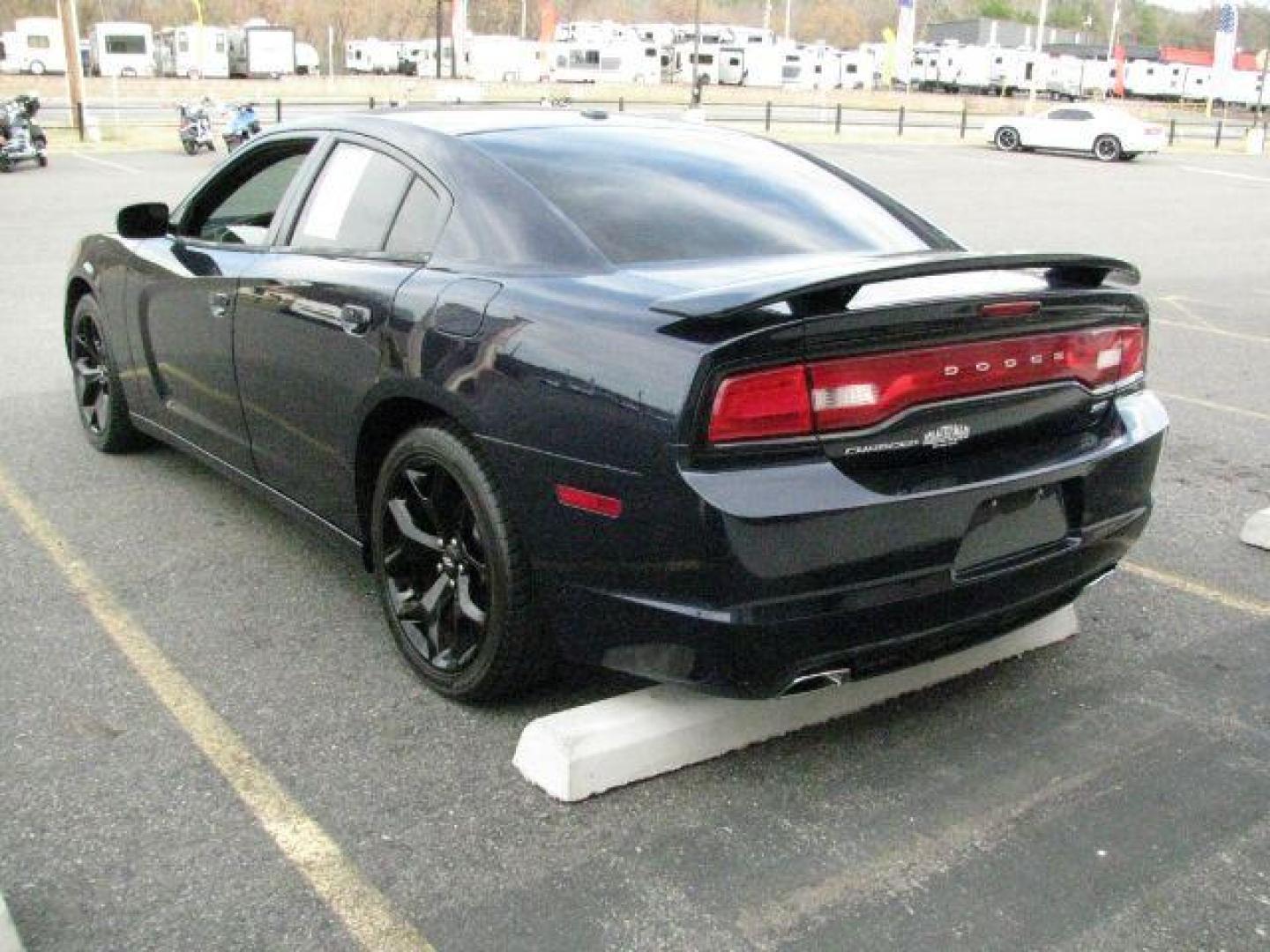 2014 Blue Dodge Charger SXT Plus (2C3CDXHG5EH) with an 3.6L V-6 DOHC engine, Automatic transmission, located at 2443 Albert Pike, Hot Springs, AR, 71913, (501) 623-6255, 34.492222, -93.109993 - Photo#2