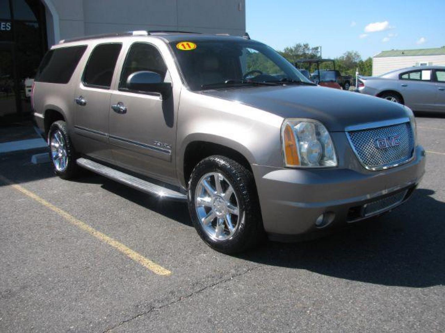 2011 Brown GMC Yukon Denali XL 4WD (1GKS2MEF9BR) with an 6.2L V8 OHV 16V engine, 6-Speed Automatic transmission, located at 2443 Albert Pike, Hot Springs, AR, 71913, (501) 623-6255, 34.492222, -93.109993 - Photo#0