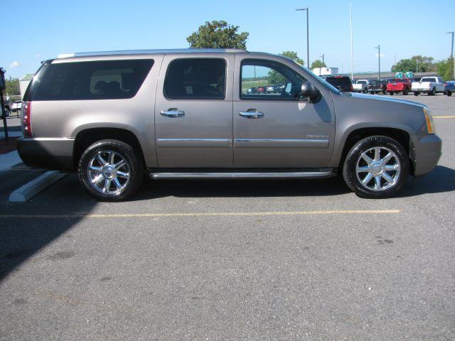 2011 Brown GMC Yukon Denali XL 4WD (1GKS2MEF9BR) with an 6.2L V8 OHV 16V engine, 6-Speed Automatic transmission, located at 2443 Albert Pike, Hot Springs, AR, 71913, (501) 623-6255, 34.492222, -93.109993 - Photo#1