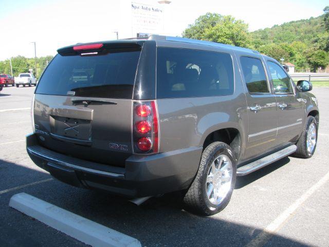 2011 Brown GMC Yukon Denali XL 4WD (1GKS2MEF9BR) with an 6.2L V8 OHV 16V engine, 6-Speed Automatic transmission, located at 2443 Albert Pike, Hot Springs, AR, 71913, (501) 623-6255, 34.492222, -93.109993 - Photo#2