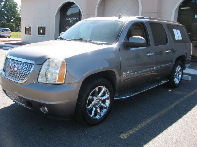 2011 Brown GMC Yukon Denali XL 4WD (1GKS2MEF9BR) with an 6.2L V8 OHV 16V engine, 6-Speed Automatic transmission, located at 2443 Albert Pike, Hot Springs, AR, 71913, (501) 623-6255, 34.492222, -93.109993 - Photo#5
