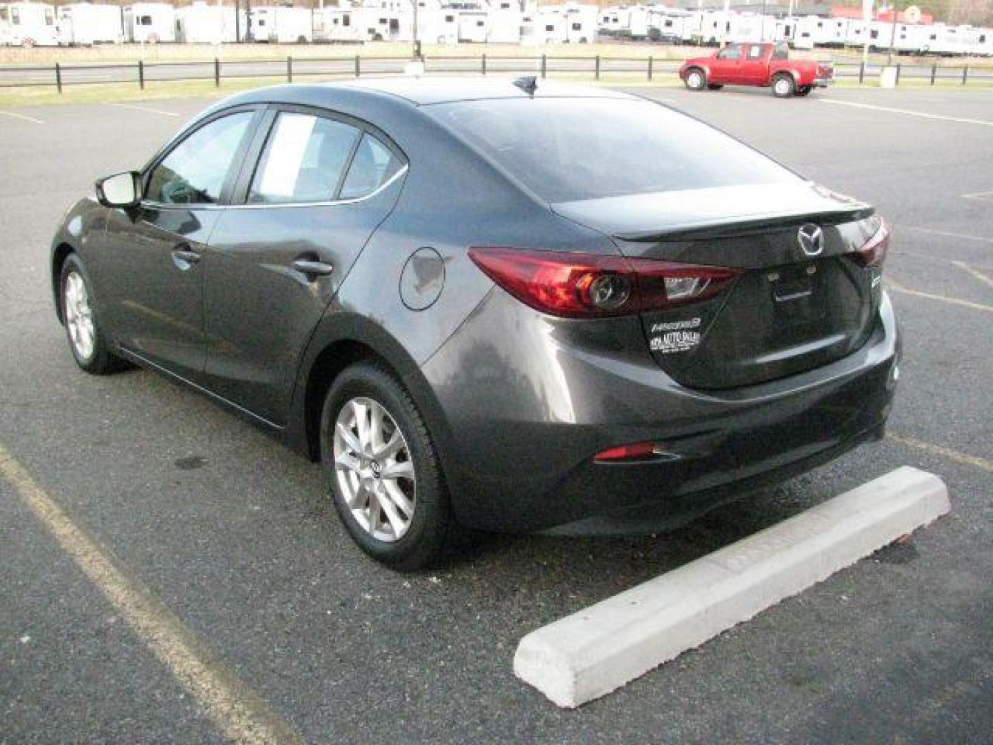 2014 Gray Mazda Mazda3 i Grand Touring (JM1BM1W78E1) with an SKYACTIV-G 2L I-4 gasoline direct injection engine, Automatic transmission, located at 2443 Albert Pike, Hot Springs, AR, 71913, (501) 623-6255, 34.492222, -93.109993 - Photo#2