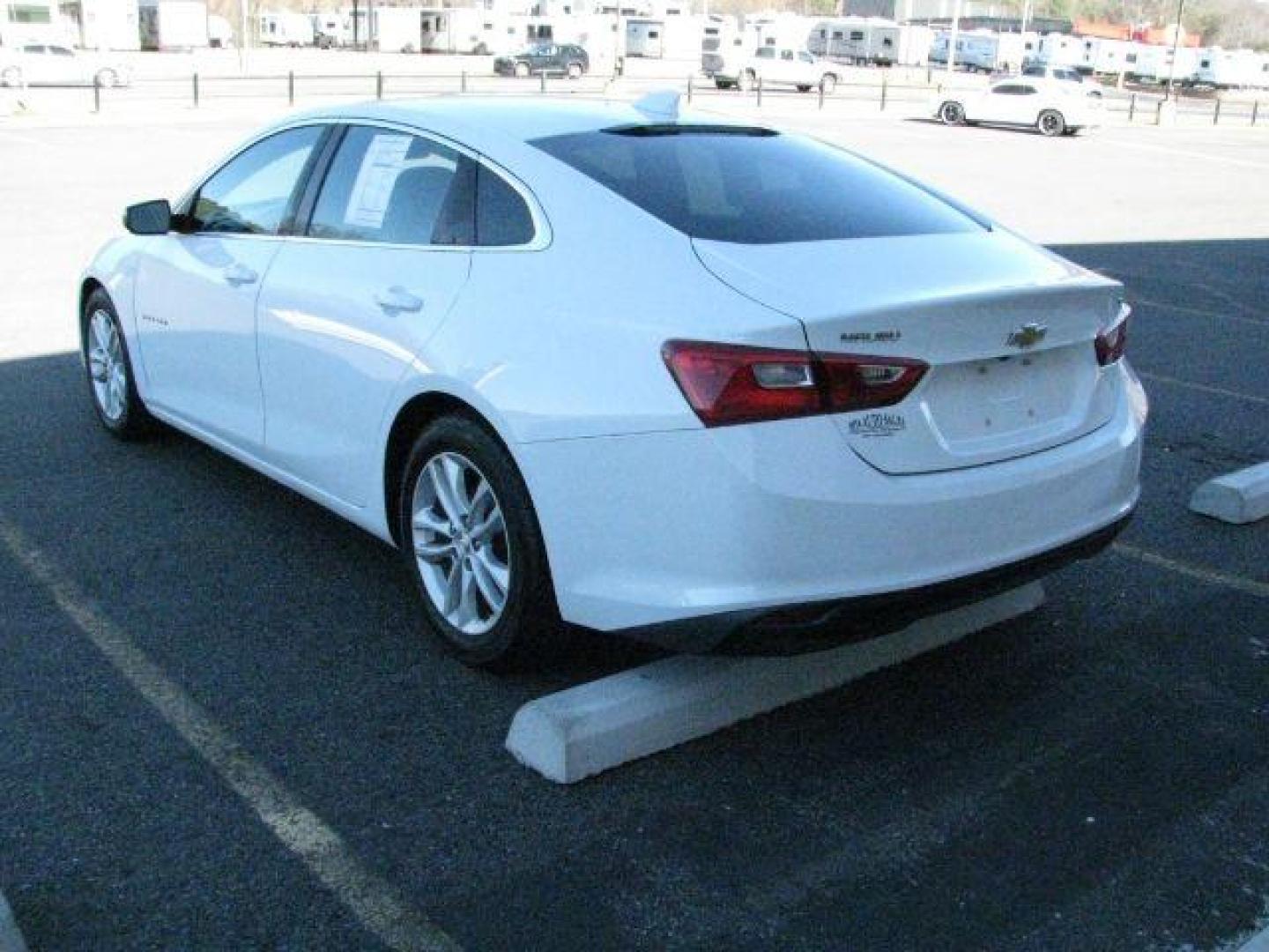 2016 White Chevrolet Malibu 1LT (1G1ZE5ST7GF) with an ECOTEC 1.5L I-4 gasoline direct injection engine, Automatic transmission, located at 2443 Albert Pike, Hot Springs, AR, 71913, (501) 623-6255, 34.492222, -93.109993 - Photo#2