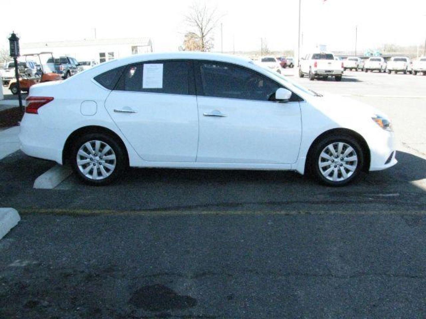 2019 White Nissan Sentra S (3N1AB7AP6KY) with an 1.8L I-4 DOHC engine, located at 2443 Albert Pike, Hot Springs, AR, 71913, (501) 623-6255, 34.492222, -93.109993 - Photo#1
