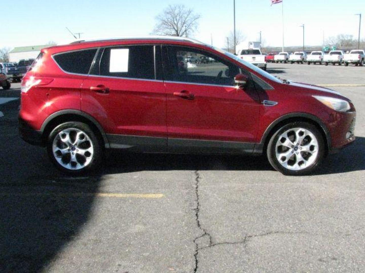 2014 Maroon Ford Escape Titanium (1FMCU0J91EU) with an EcoBoost 2L I-4 gasoline direct injection engine, Automatic transmission, located at 2443 Albert Pike, Hot Springs, AR, 71913, (501) 623-6255, 34.492222, -93.109993 - Photo#1