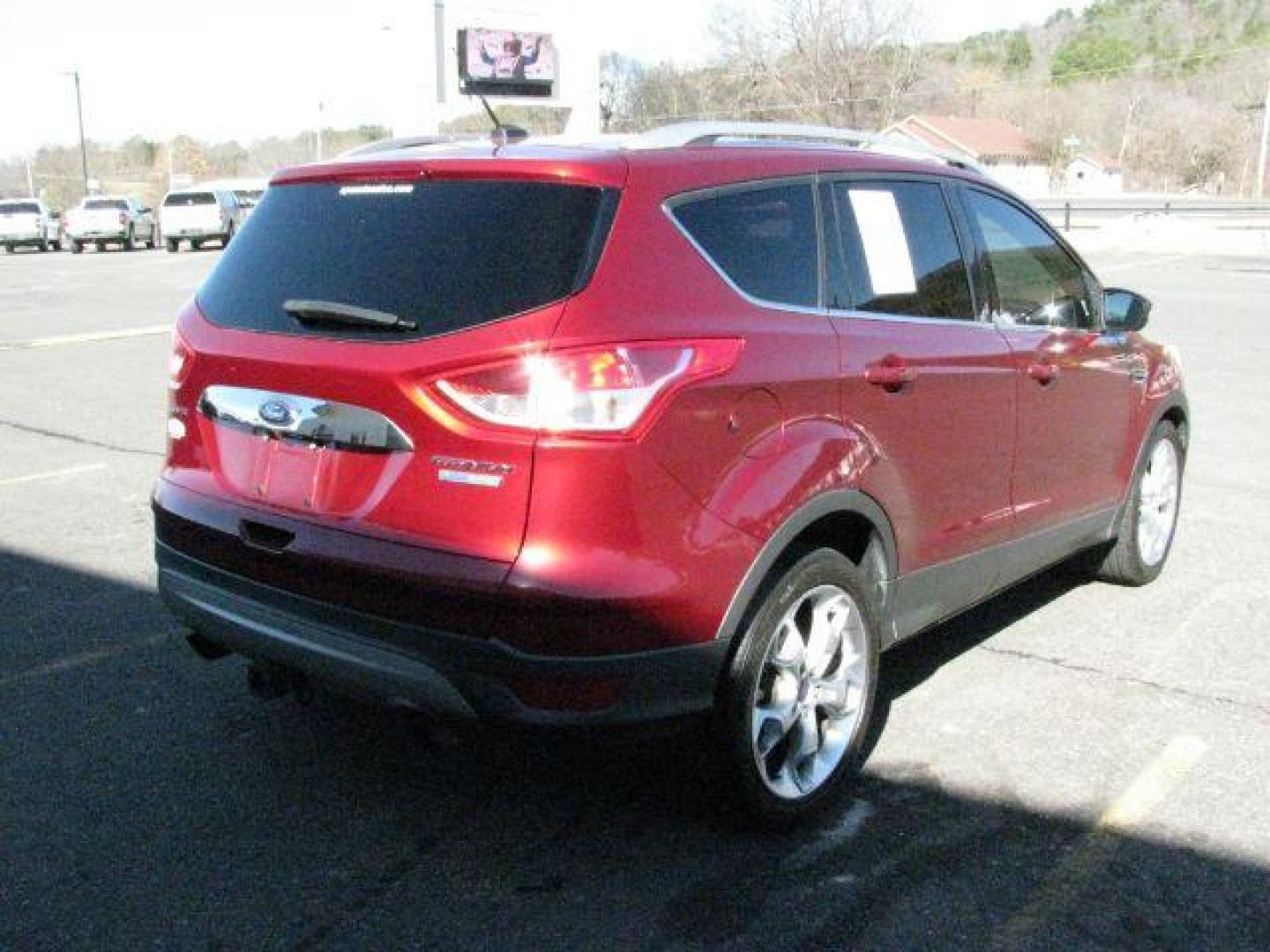 2014 Maroon Ford Escape Titanium (1FMCU0J91EU) with an EcoBoost 2L I-4 gasoline direct injection engine, Automatic transmission, located at 2443 Albert Pike, Hot Springs, AR, 71913, (501) 623-6255, 34.492222, -93.109993 - Photo#2