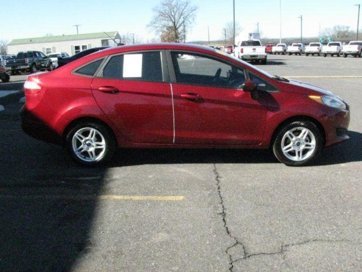 2017 Maroon Ford Fiesta SE (3FADP4BJ2HM) with an 1.6L I-4 DOHC engine, Automatic transmission, located at 2443 Albert Pike, Hot Springs, AR, 71913, (501) 623-6255, 34.492222, -93.109993 - Photo#1