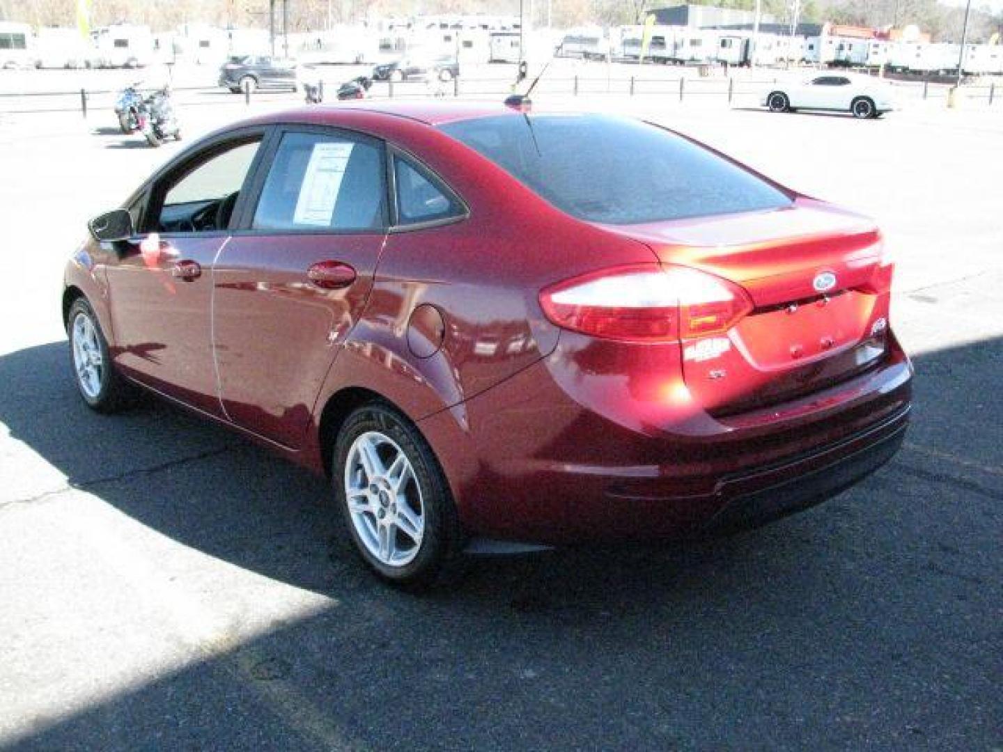 2017 Maroon Ford Fiesta SE (3FADP4BJ2HM) with an 1.6L I-4 DOHC engine, Automatic transmission, located at 2443 Albert Pike, Hot Springs, AR, 71913, (501) 623-6255, 34.492222, -93.109993 - Photo#3