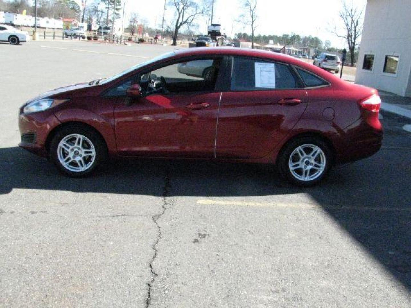2017 Maroon Ford Fiesta SE (3FADP4BJ2HM) with an 1.6L I-4 DOHC engine, Automatic transmission, located at 2443 Albert Pike, Hot Springs, AR, 71913, (501) 623-6255, 34.492222, -93.109993 - Photo#4