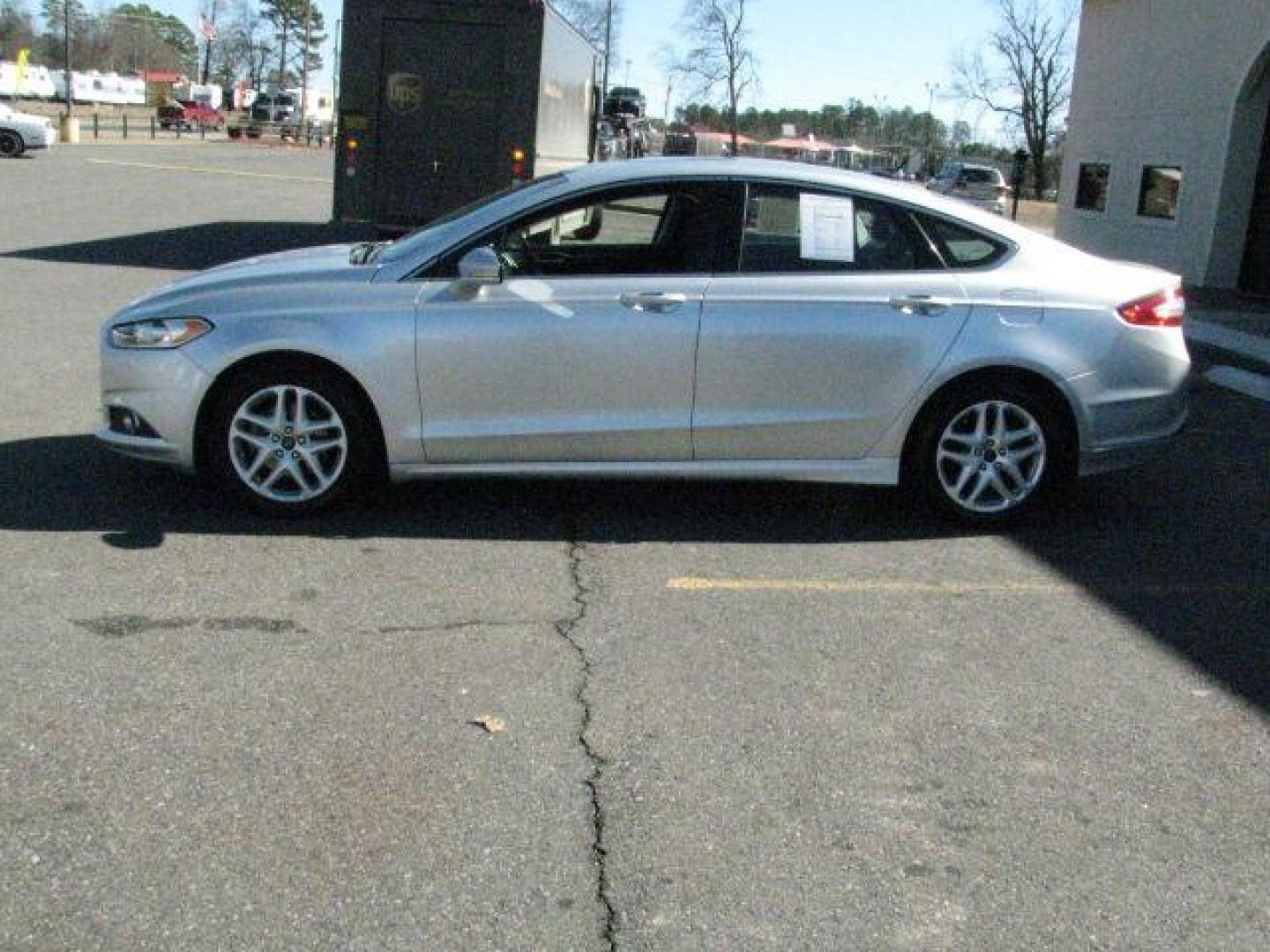 2016 Silver Ford Fusion SE (1FA6P0HD5G5) with an 1.5L L4 DOHC 16V engine, 6-Speed Automatic transmission, located at 2443 Albert Pike, Hot Springs, AR, 71913, (501) 623-6255, 34.492222, -93.109993 - Photo#1