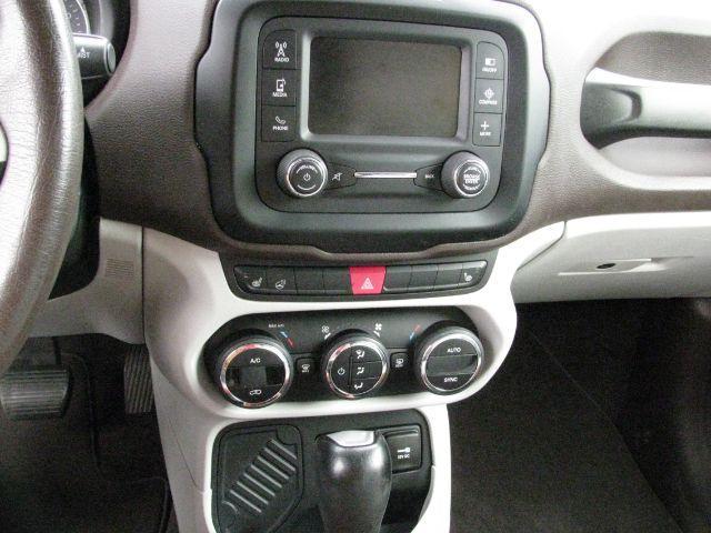 2015 Black Jeep Renegade Limited (ZACCJADT1FP) with an MultiAir2 Tigershark 2.4L I-4 variable valve contr engine, CVT transmission, located at 2443 Albert Pike, Hot Springs, AR, 71913, (501) 623-6255, 34.492222, -93.109993 - Photo#9