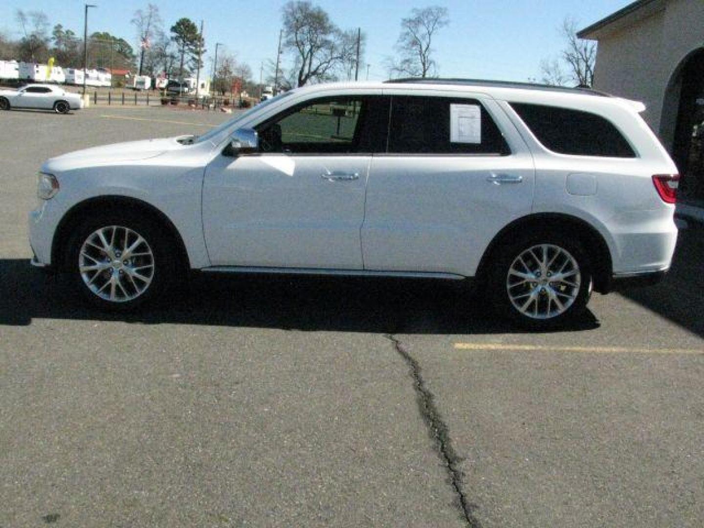 2016 White Dodge Durango SXT (1C4RDHAG3GC) with an Pentastar 3.6L V-6 DOHC engine, Automatic transmission, located at 2443 Albert Pike, Hot Springs, AR, 71913, (501) 623-6255, 34.492222, -93.109993 - Photo#1