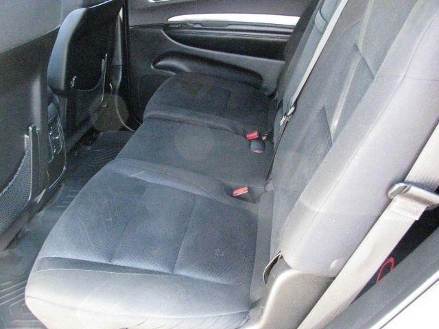 2016 White Dodge Durango SXT (1C4RDHAG3GC) with an Pentastar 3.6L V-6 DOHC engine, Automatic transmission, located at 2443 Albert Pike, Hot Springs, AR, 71913, (501) 623-6255, 34.492222, -93.109993 - Photo#7