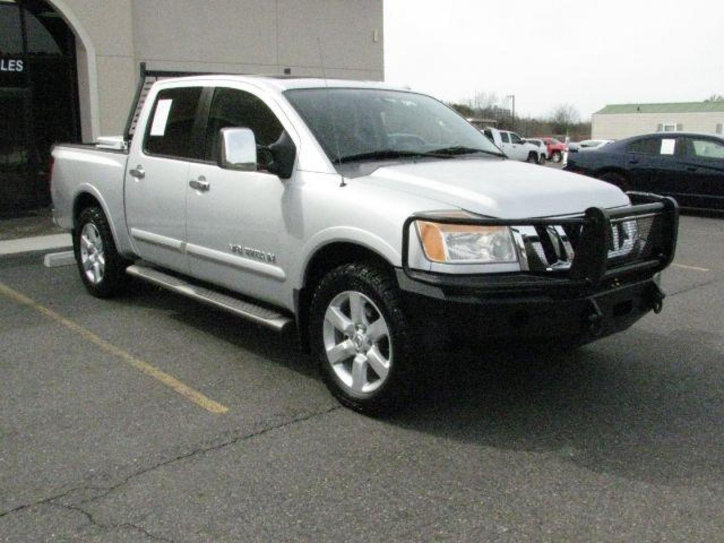 2012 Silver Nissan Titan SL (1N6BA0ED0CN) with an Endurance 5.6L V-8 DOHC engine, Automatic transmission, located at 2443 Albert Pike, Hot Springs, AR, 71913, (501) 623-6255, 34.492222, -93.109993 - Photo#0