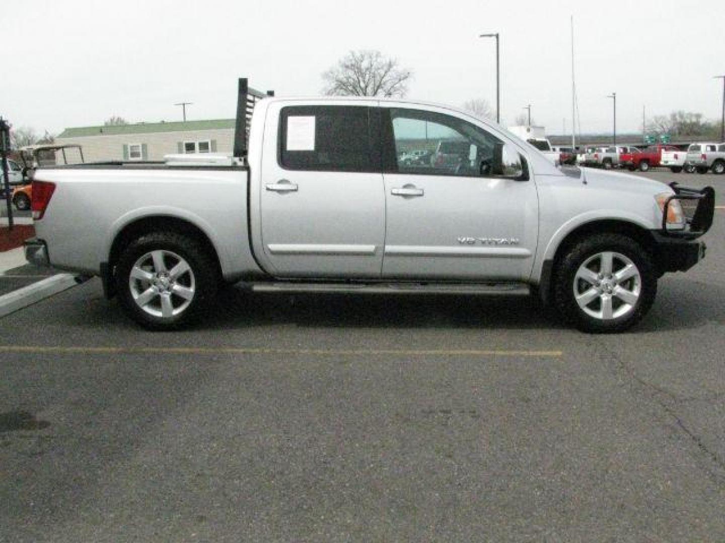 2012 Silver Nissan Titan SL (1N6BA0ED0CN) with an Endurance 5.6L V-8 DOHC engine, Automatic transmission, located at 2443 Albert Pike, Hot Springs, AR, 71913, (501) 623-6255, 34.492222, -93.109993 - Photo#1